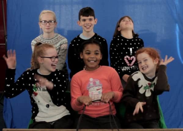 William Alvey pupils recording the video for their Christmas single. EMN-170812-161341001