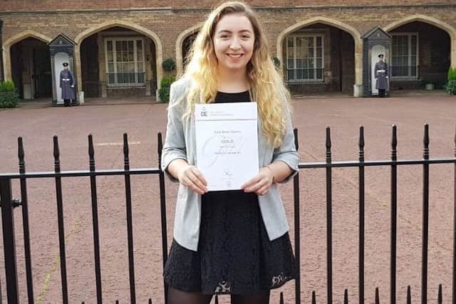 Katie Flaherty with her Gold Award certificate. EMN-170812-144951001