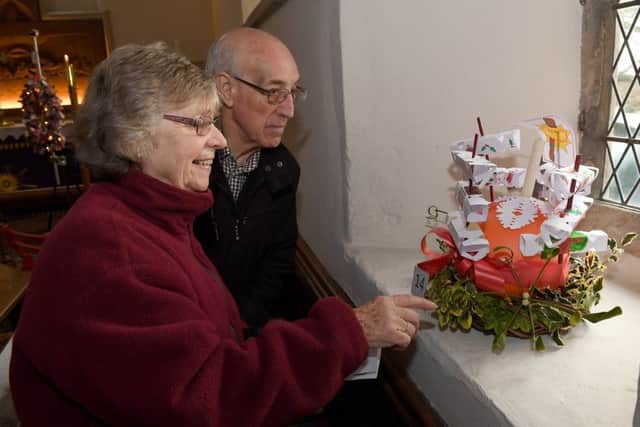 Wellingore parish church, wreath festival. Roy Hallworth and Brenda Thompson. EMN-170412-121909001