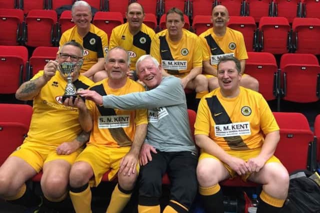 Boston United walking football players. RlZ8S8h38jWu2I7eWB86
