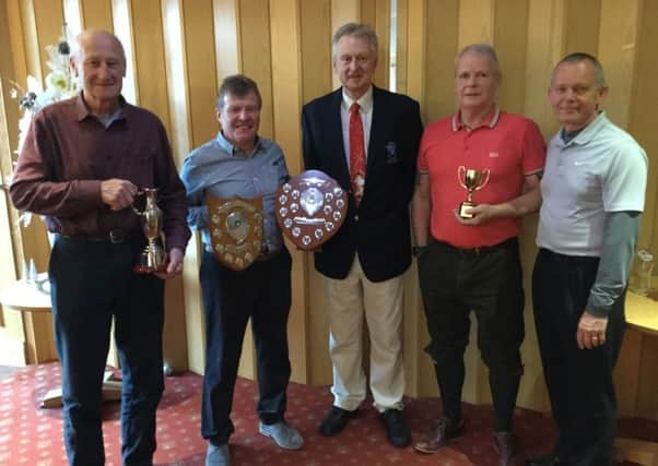Outgoing seniors captain Bryan Utteridge (centre) with prize winners, from left, Dave Turver, Eric Turner, Alan Simmons and Steve Blyth. EMN-171112-130902002