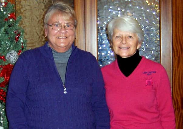 Lady Captain Janet Read and Ann Gullick.