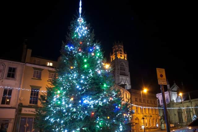 Prizes are up for grabs for the best selfies in front of Boston's Christmas tree.