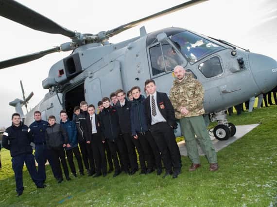A Royal Navy Merlin helicopter dropped in on Carre's Grammar School to encourage students to take up science, technology, engineering and maths.