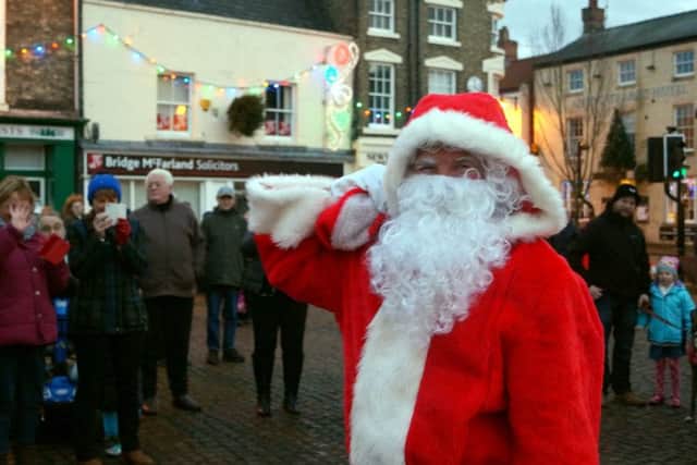 Father Christmas as he arrived in the Market Place last year EMN-171215-164450001