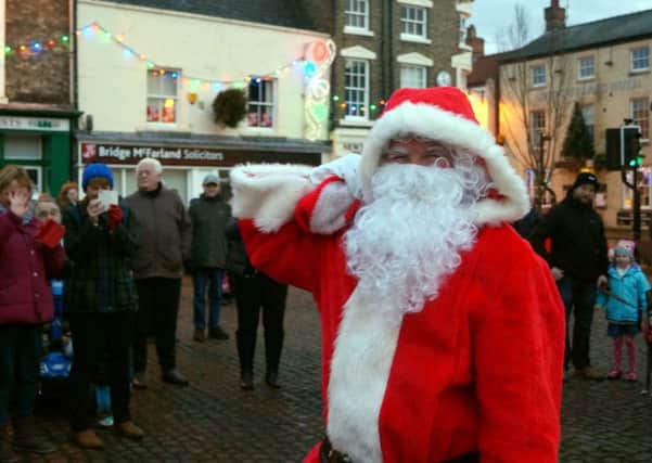 Father Christmas as he arrived in the Market Place last year EMN-171215-164450001