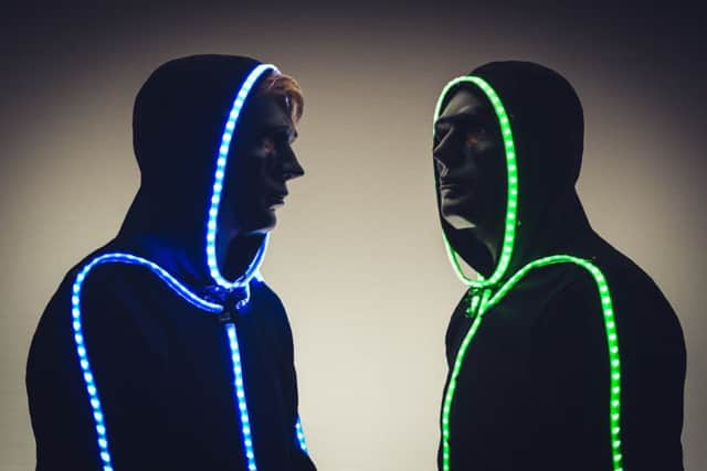 Coming to Boston's Assembly Rooms, The Stickmen.