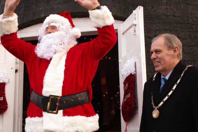 Santa in Burgh le Marsh with Mayor Coun Neil Cooper. Picture: Eileen Chantry.