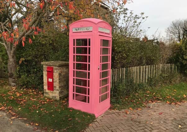 - with people being encouraged to sign the pink litter bin inside and drop in a donation in aid of two cancer charities.