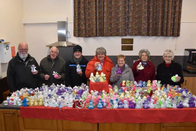 Pictured with the angels before heading out to place them around Wragby are, from left, Mike Fricke, Laurie Lambert, David Parsons, Mo Fricke, Maureen Hookings Joyce Parsons and Ann Lambert EMN-171222-063944001