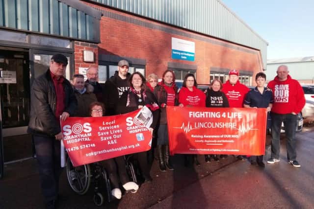 Vowing to fight on. Grantham Hospital campaigners outside the ULHT board meeting in Sleaford. EMN-171215-131013001