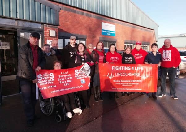 Vowing to fight on. Grantham Hospital campaigners outside the ULHT board meeting in Sleaford. EMN-171215-131013001