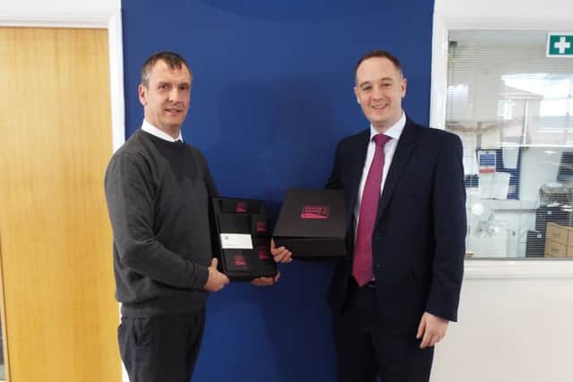 Howard Handley, Managing Director Seacroft Ford, (left) with James Horne, (right), Dealership Development Manager, Motability Operations.