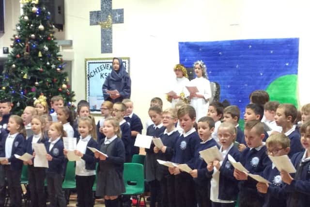 Wainfleet Magdalen Primary School Key Stage Two pupils tell 'The True Meaning of Christmas'. ANL-171218-154506001