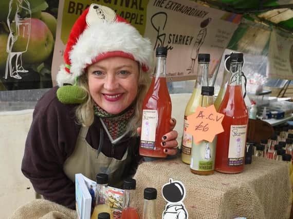 Suzannah Starkey with her apple juice at the Gifted Contempory Christmas market at the NCCD in Sleaford.