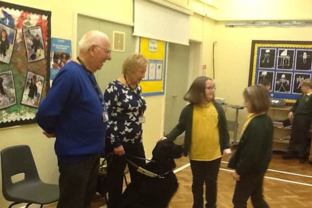 Children from Tetford School meeting Guide Dog Usher during their Diversity Day EMN-171217-215100001