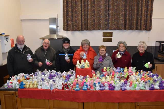 Pictured with the angels before heading out to place them around Wragby are, from left, Mike Fricke, Laurie Lambert, David Parsons, Mo Fricke, Maureen Hookings Joyce Parsons and Ann Lambert EMN-171222-063944001