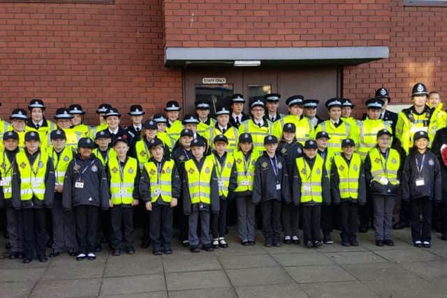 Mini Police pictured with police cadets ready for the Remembrance Parade in November.