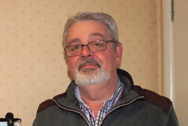 Gary Denniss, chairman of Louth Independent Traders, with one of the emergency blanket packs.