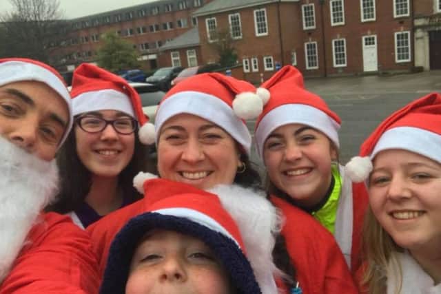 Mablethorpe RC junior Willow Van Landeghem completed the Lincoln Santa Fun Run with her family EMN-171218-155713002