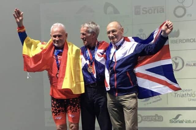 John Caborn on the podium.