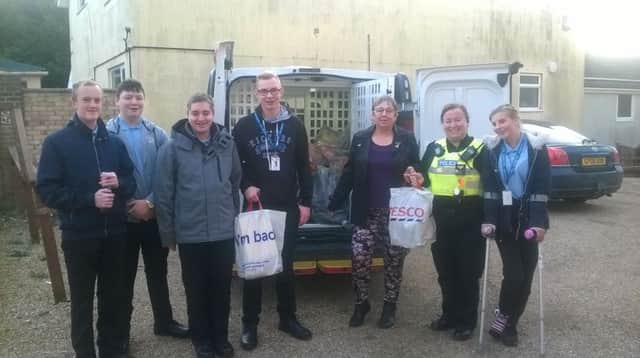 Skegness Police Cadets with Sgt Kate Odlin were at Tescos on Monday collectingdonations for the Christmas Appeal at the Storehouse food bank. ANL-171219-103056001