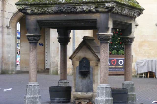 The water fountain in Sleaford Market Place erected in 1874 in memory of Frederick William, 6th Earl and 2nd Marquis of Bristol, by his Lincolnshire tenants. EMN-171222-101847001