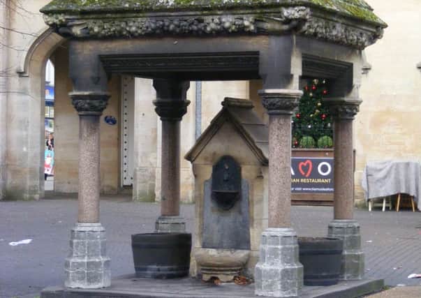 The water fountain in Sleaford Market Place erected in 1874 in memory of Frederick William, 6th Earl and 2nd Marquis of Bristol, by his Lincolnshire tenants. EMN-171222-101847001