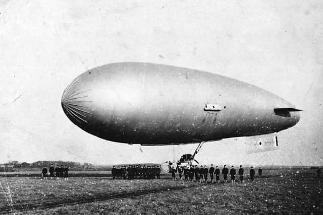 Submarine Scout airship being handled by US Naval ratings based at Cranwells Lighter than Air Section, 1918. EMN-171219-141017001