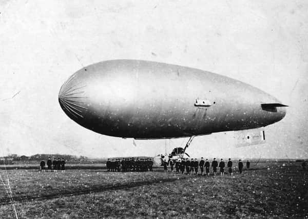 Submarine Scout airship being handled by US Naval ratings based at Cranwells Lighter than Air Section, 1918. EMN-171219-141017001