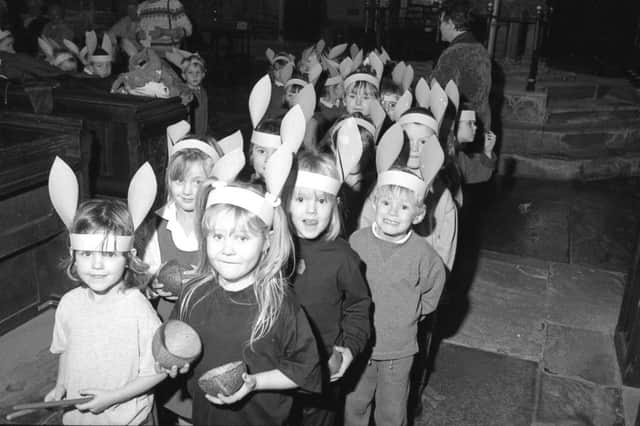 'Ear we see Boston schoolchildren taking part in a special carol service at St Botolphs Church, in the town, in 1997.