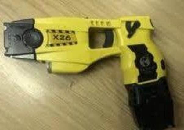 A police taser. EMN-171219-171548001