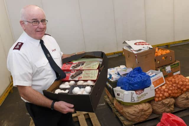 Food for charities being collected from Martin's Produce, Boston. Major Gerald Nicoll of Boston Salvation Army. EMN-171220-104727001