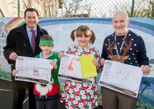 Lovelle Estate Agents organised a Design A House of the Future competition.  Winner Martha Fosdyke and Austin Reynolds-Allen (3rd) are  pictured (left) with Simon Jory and Garth Hicks.