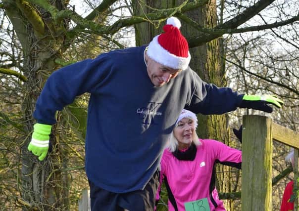 An image from last years event shows these runners are showing off their Christmas spirit.