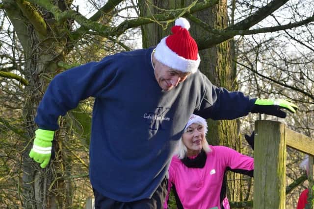 An image from last years event shows these runners are showing off their Christmas spirit.