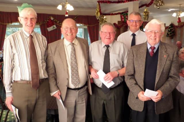 A selection of seniors trophy winners from 2017 with Richard Walker EMN-171221-094540002