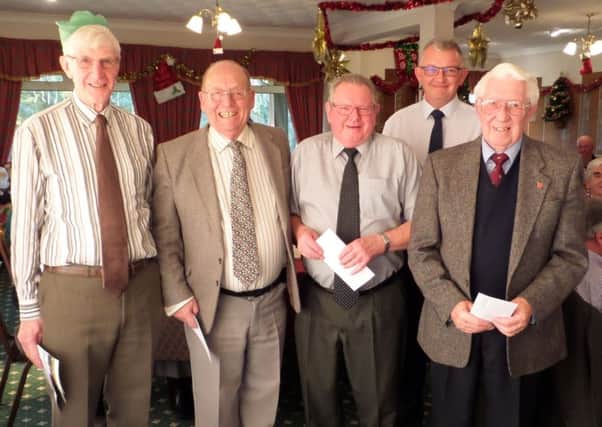A selection of seniors trophy winners from 2017 with Richard Walker EMN-171221-094540002