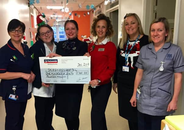 A scene from the cheque presentation.