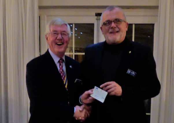Pictured is Rotary Club President Bill Wood and Salvation Army Major Rudi Bruinewoud.