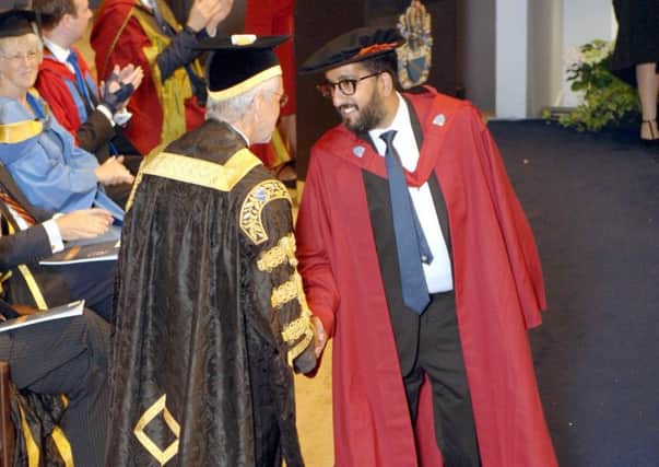 Sheeraz Janjua receives his Doctor of Optometry degree