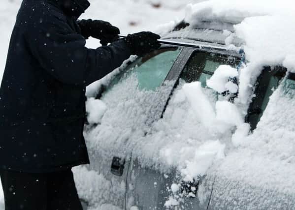 Car in snow SUS-171222-153547001