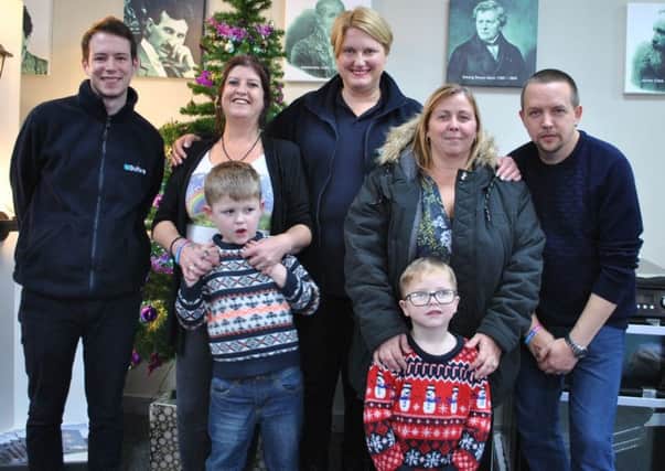 Butlers choose their charity for the year. From left - (back) electrician Liam North, Rainbow Stars founder Jane Peck, Butlers Company Secretary Kate Cook, Rainbow Stars committee member Tara Tregent, Jane's husband Adrian and (front) Dylan and Aiden Peck. EMN-171227-122823001