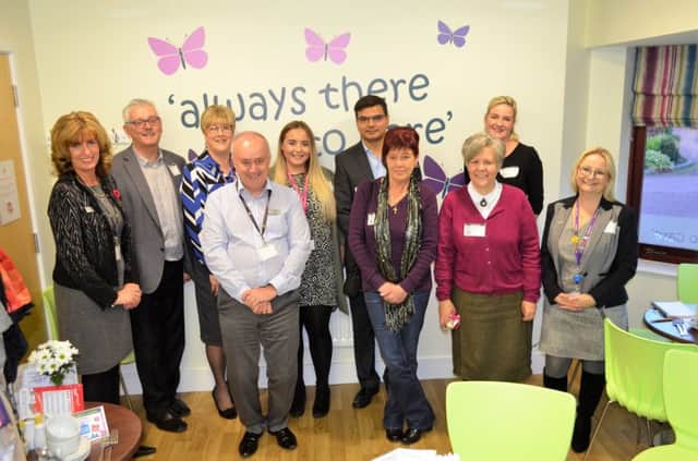 Lindsey Lodge Hospice Chief Executive Karen Griffiths (left) and
Fundraiser Andy Hirst (fourth from left), are pictured with Ongo Chief Executive Andy Orrey (second from left) and Director of Resources Erika Stoddart (third right) along with members of the Ongo Team. EMN-171222-214844001