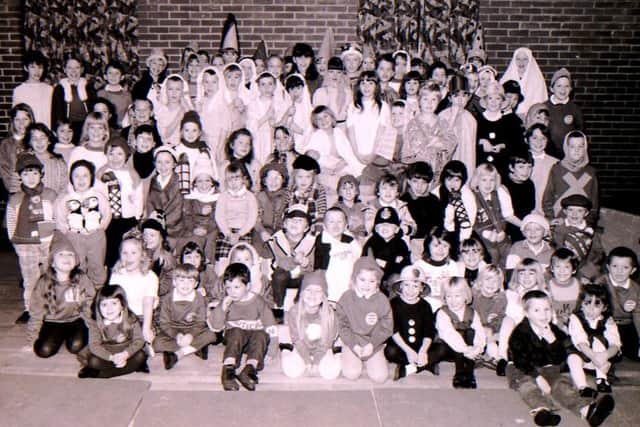 The cast form Pointon School's three Christmas plays in 1992. EMN-171227-172800001