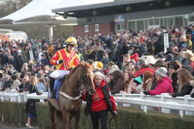 A packed parade ring at last year's Boxing Day race meeting EMN-171227-132509002