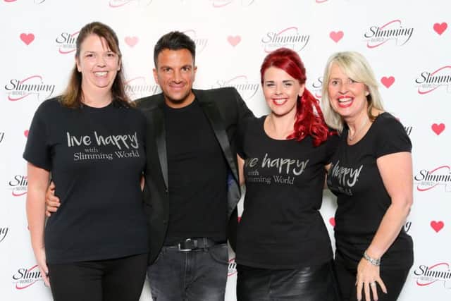 Slimming World consultants Angela Tellefsen, Jo Burnett and Sharon Grove with Peter Andre.
