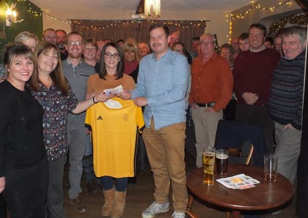 Members of Horncastle Hockey Club join pub regulars and staff at the presentation night. Photo: Supplied
