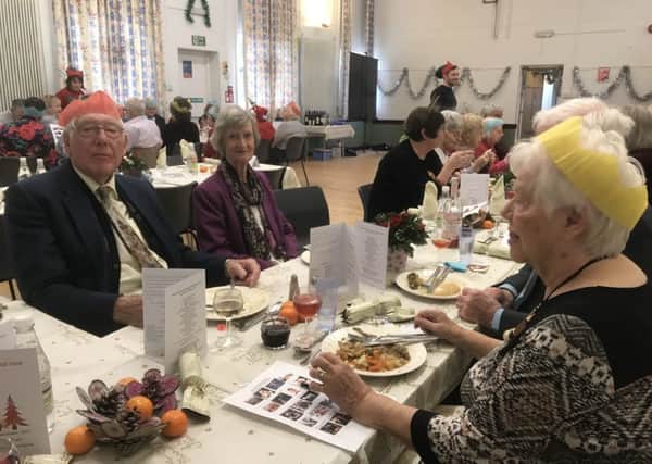 People enjoying the first Christmas Community Lunch.