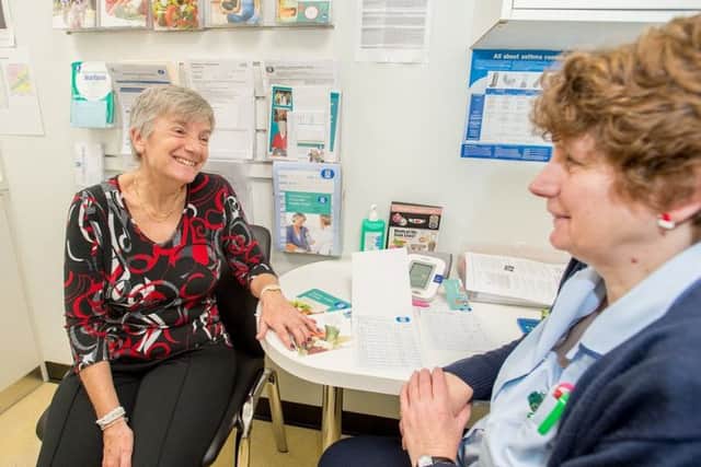 Stef Round chatting about the programme in a Lincolnshire Co-op pharmacys consultation room.